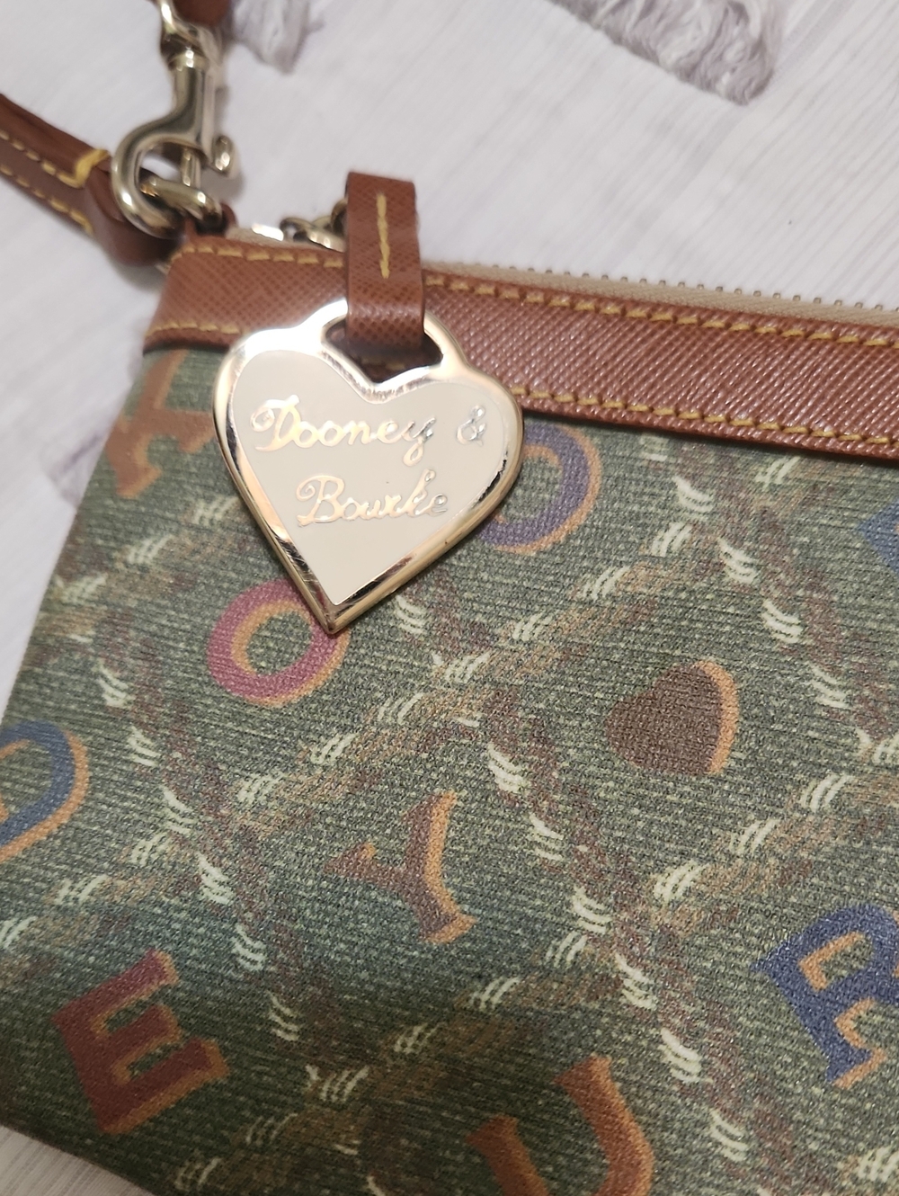 Vintage, Dooney & Bourke Green Signature Canvas Wristlet with Gold Heart Charm